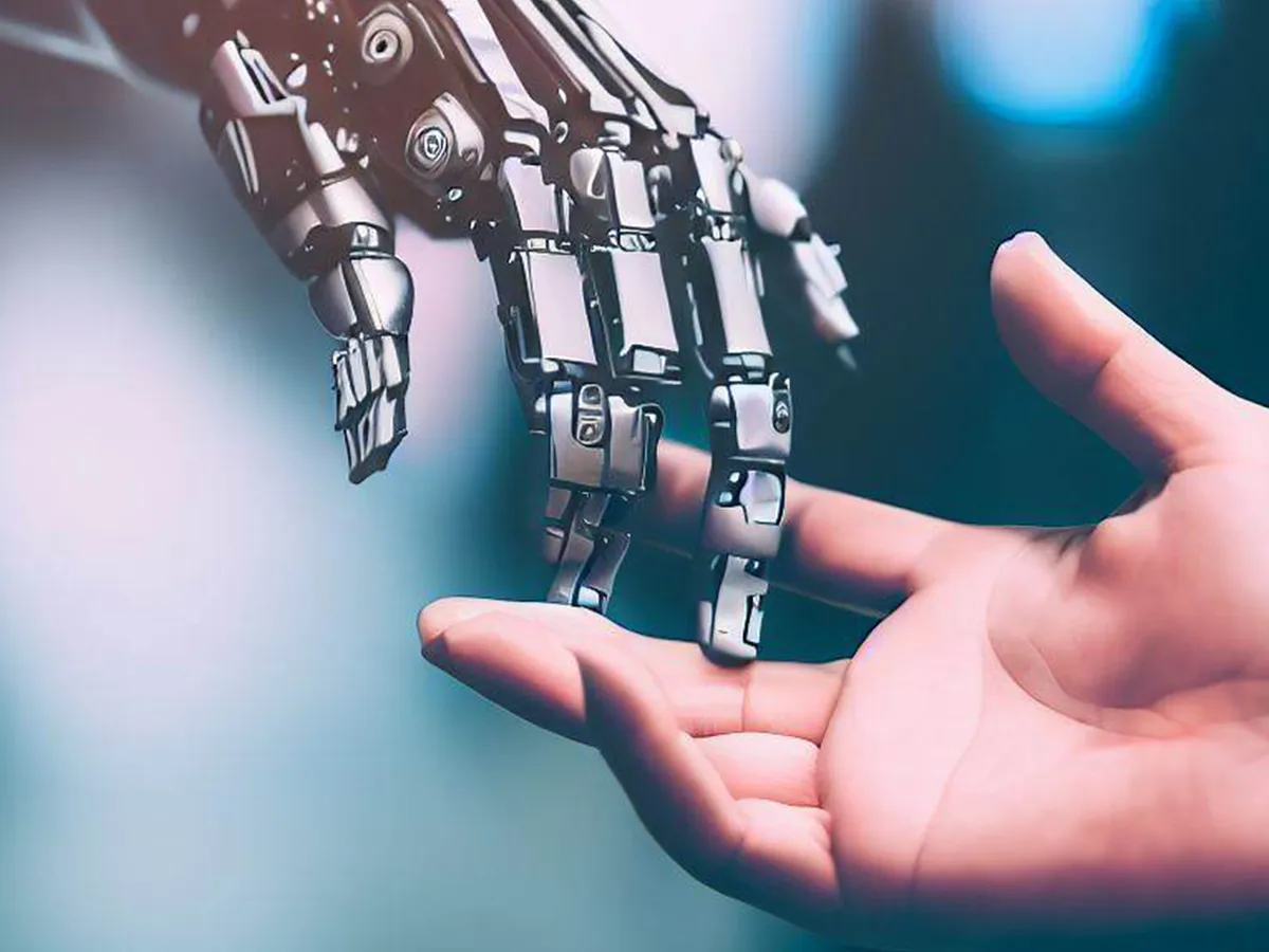 A robotic hand is reaching towards a human hand, symbolizing the connection between technology and humanity. The contrasting materials highlight the merging of artificial intelligence with human experience. The background is softly blurred, emphasizing the hands in focus.