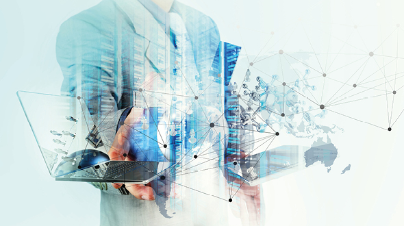 A business professional extends a hand while holding an open laptop. The background features abstract digital elements, including a world map and connected lines, symbolizing technology, connectivity, and global reach in business.