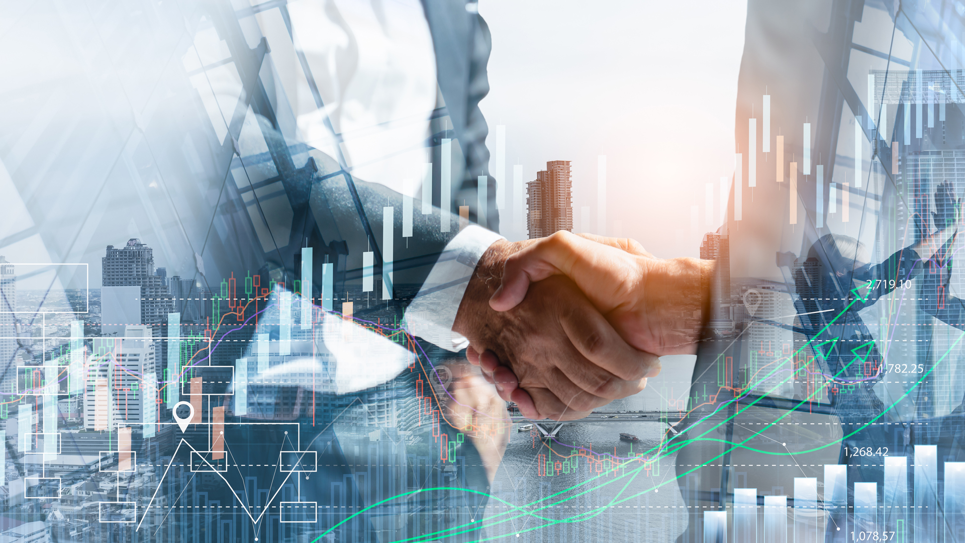 Two business professionals are shaking hands with a city skyline in the background. Overlayed graphs and charts suggest themes of finance and business growth. The handshake symbolizes partnership and collaboration in a corporate environment.